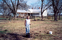 Michael Woodfin planting bulbs at Inn